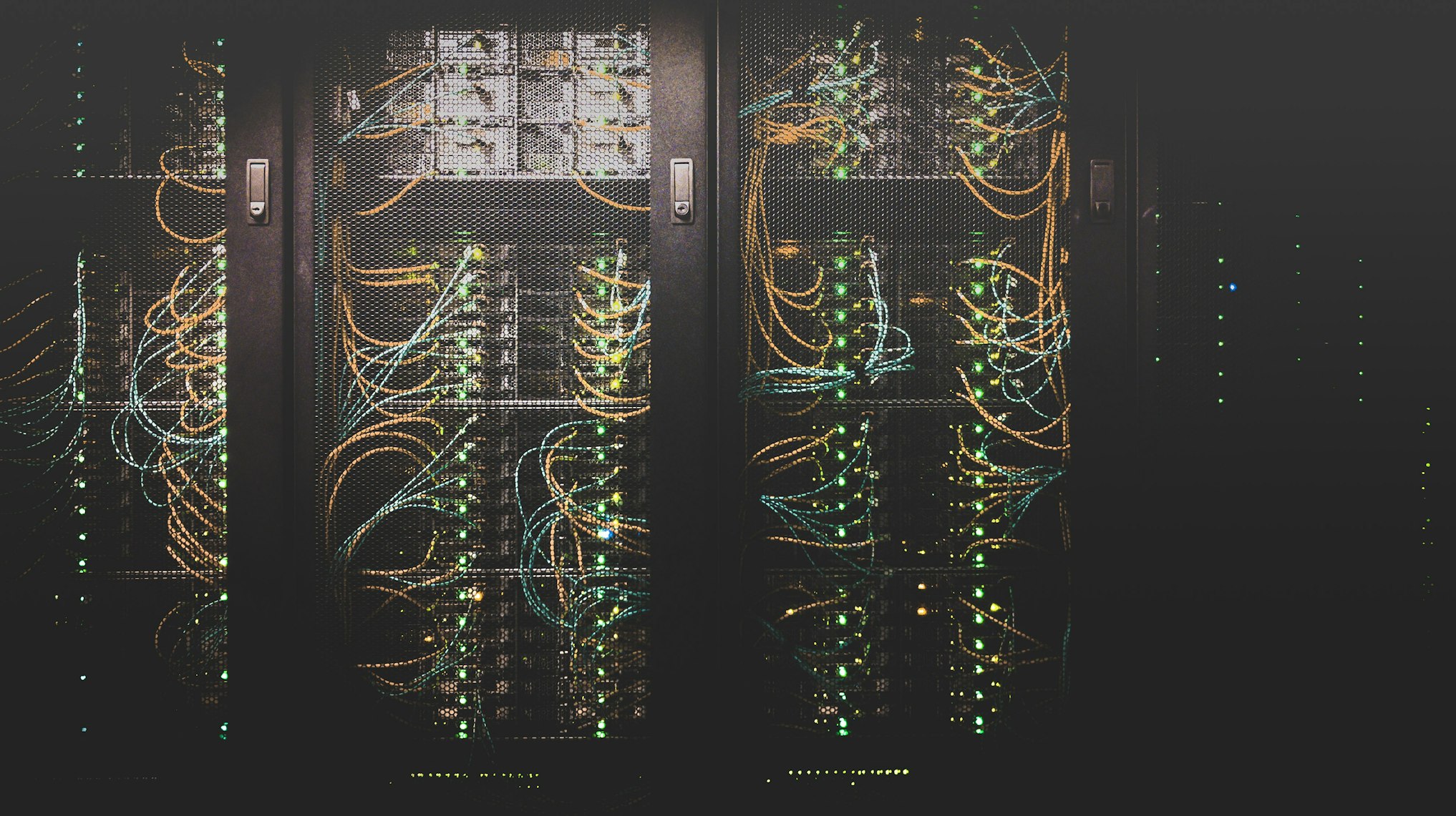 Futuristic dark data center filled with illuminated server racks, cyber neon aesthetic, highly technological environment